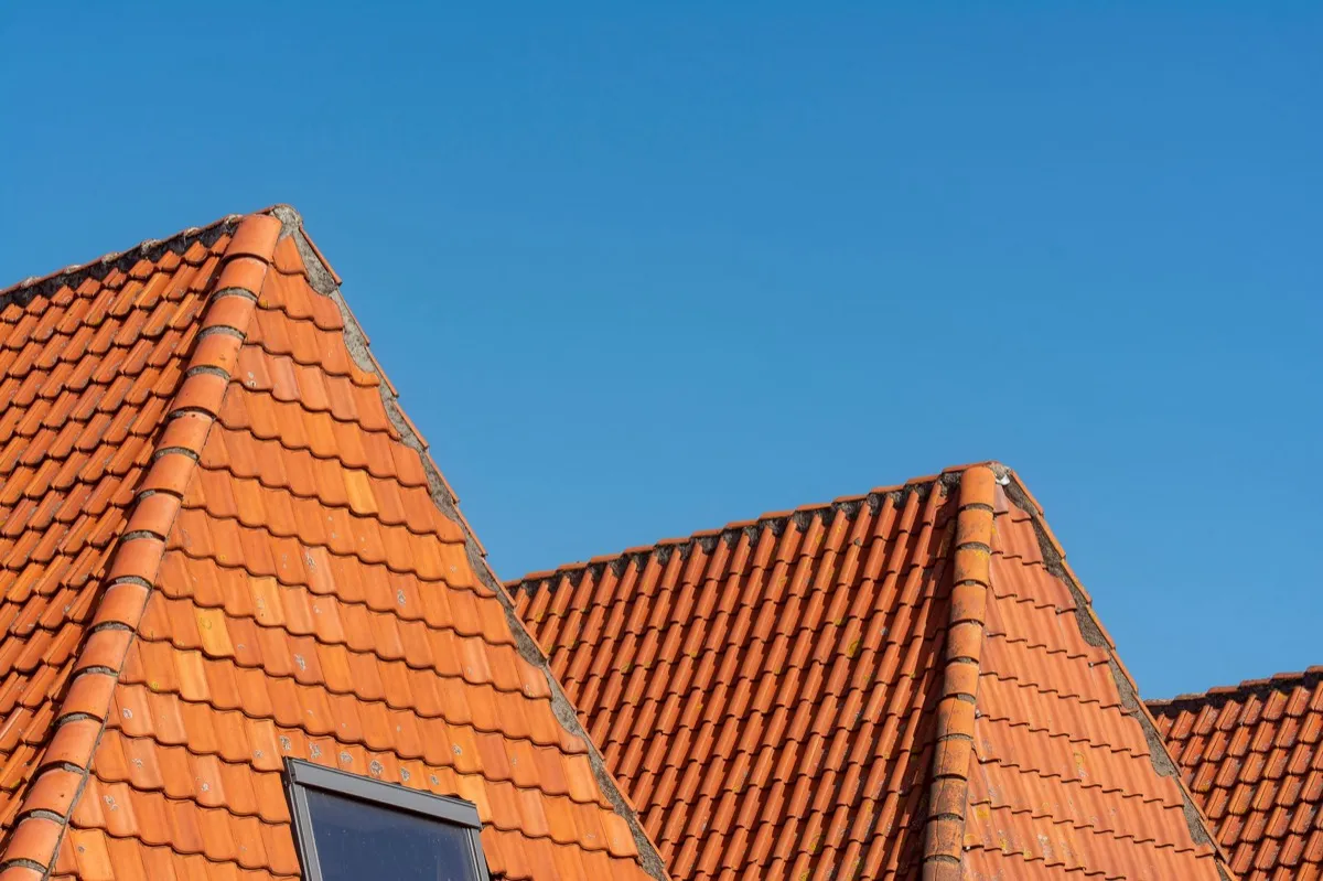 Clay barrel tile rooflines on homes in Joplin, MO